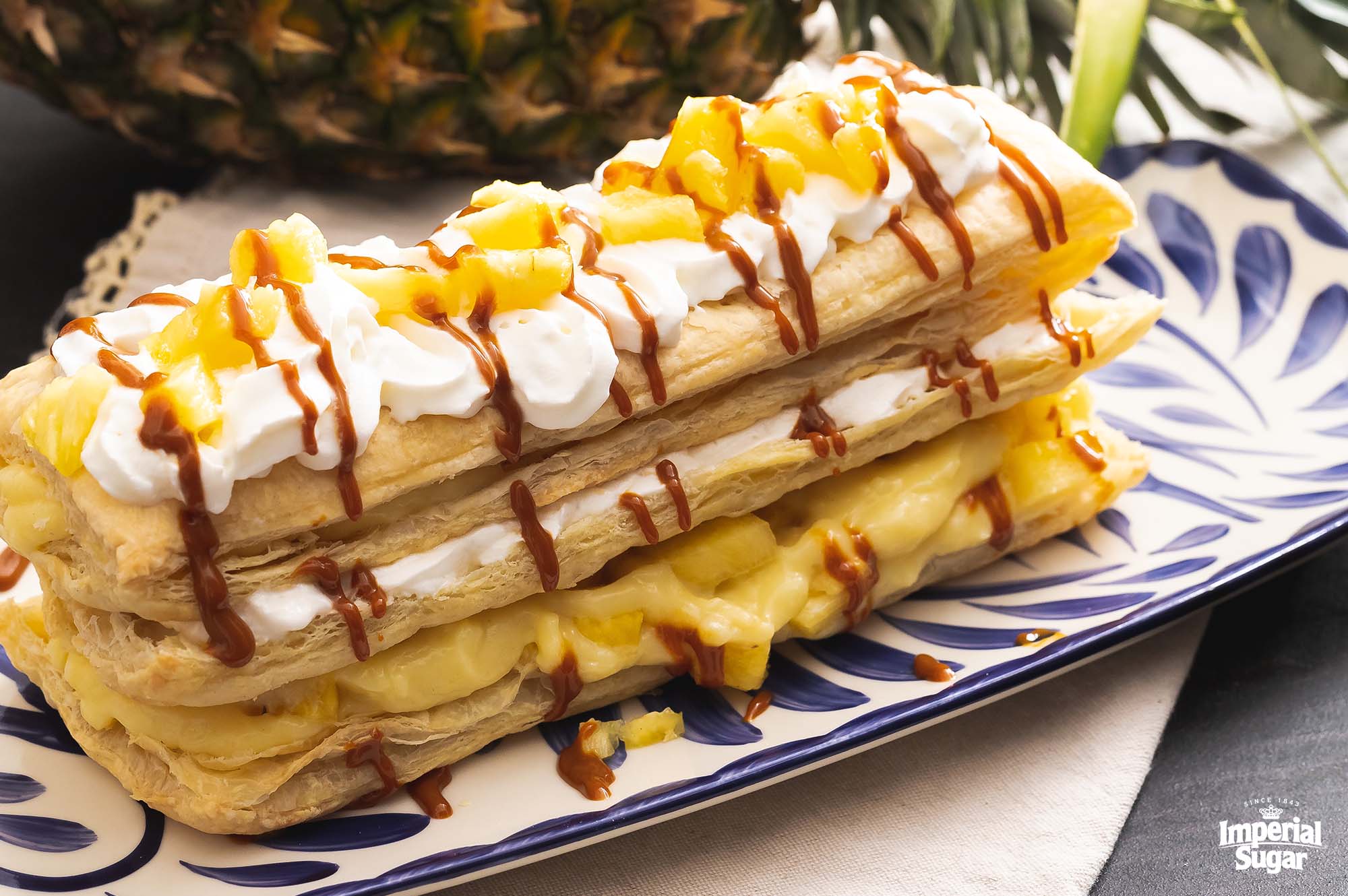https://www.imperialsugar.com/sites/default/files/recipe/Pineapple-Dulce-de-Leche-Milhojas-Cake-imperial.jpg