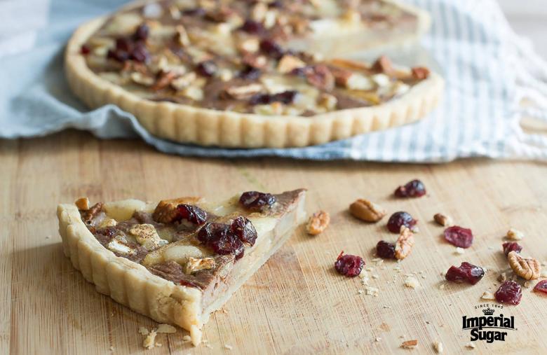 Caramelized Pear & Brie Tart with Cranberries & Candied Pecans